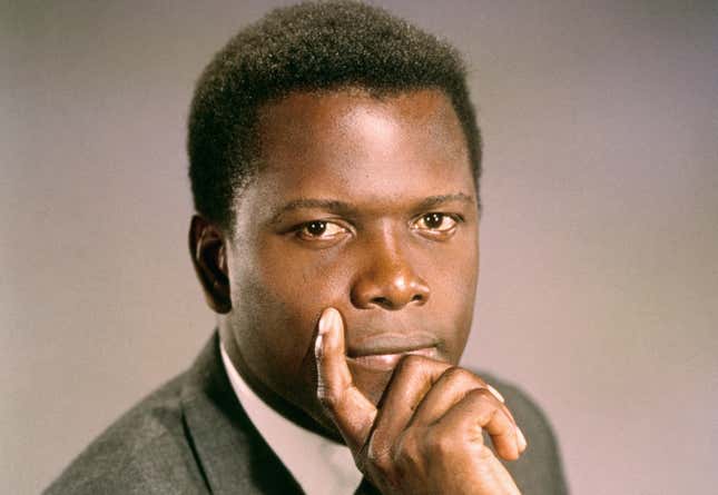 Sidney Poitier, looking straight ahead with his hand wrapped around his chin, circa March 1966.