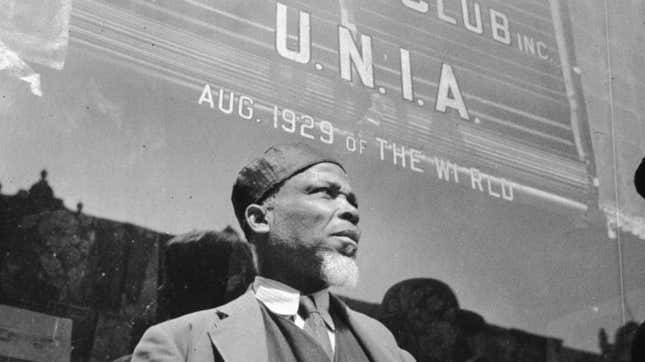 April 1943: A follower of Marcus Garvey, the founder of the United Negro Improvement Association, outside a UNIA club in New York.